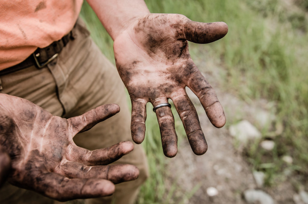 Garden dirt hands