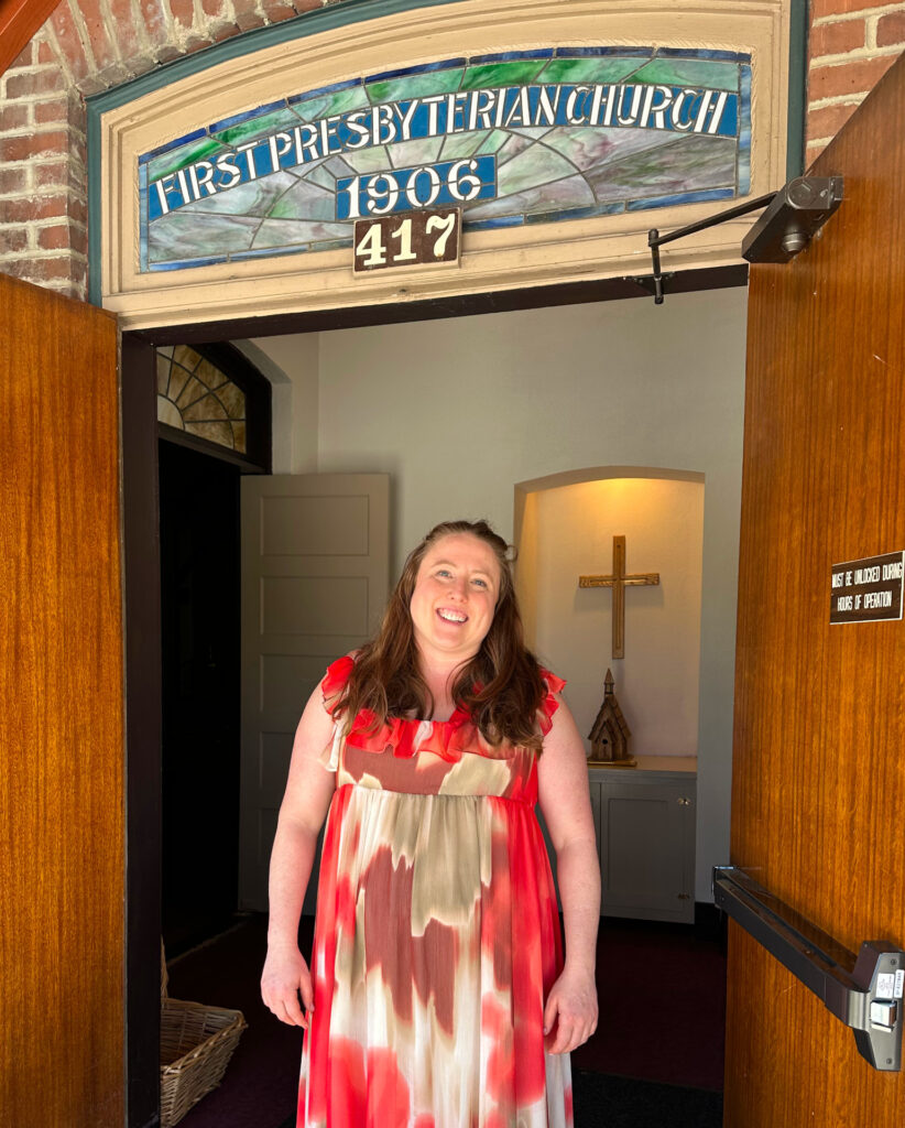Interim Pastor of First Presbyterian Church of Sandpoint, standing at the Alder Street entrance